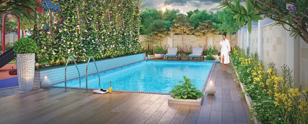 Swimming pool with deck and garden